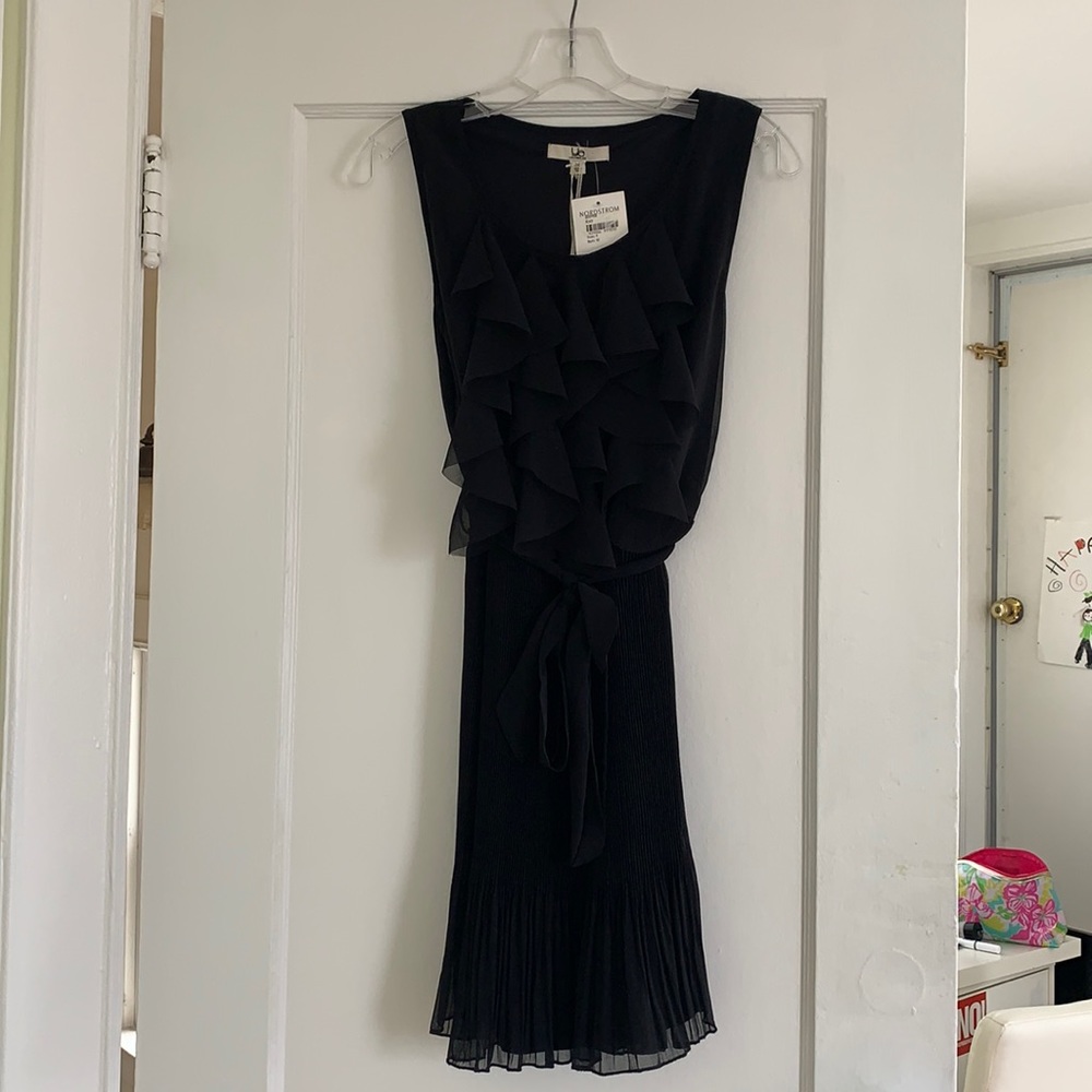 black ruffly dress